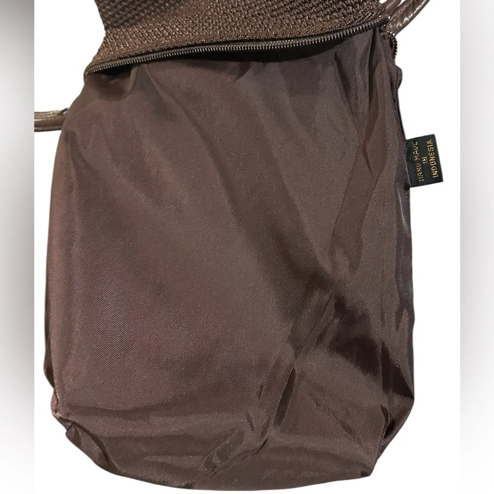The Sak crochet brown woven shoulder bag / hobo handbag.